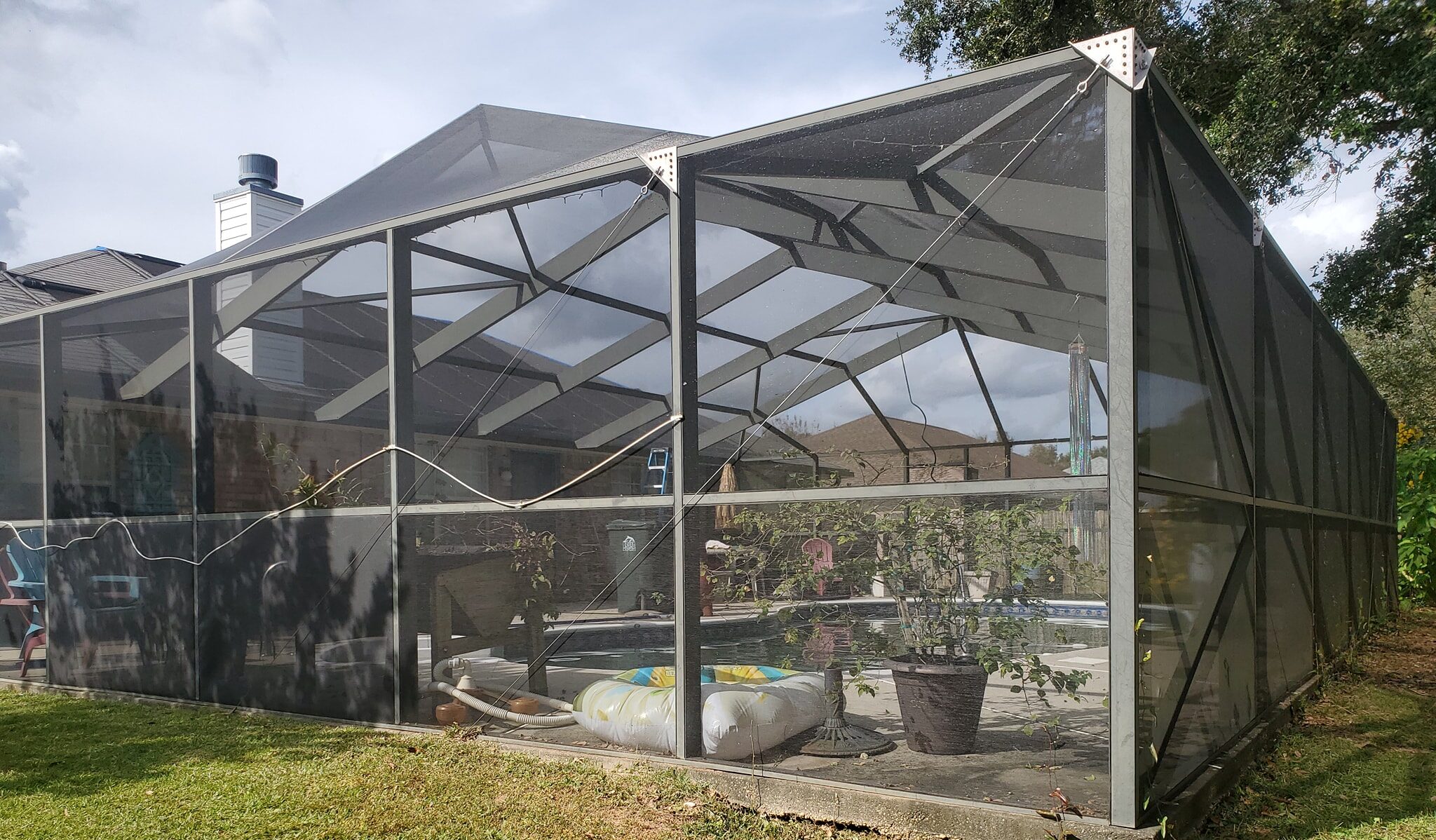 Pool cage rescreening with clean new screen mesh in Northwest Florida