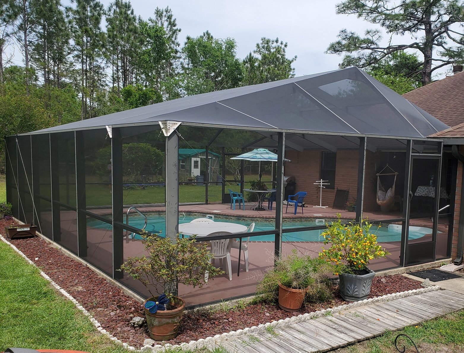 Pool screen enclosure built by Villane's Enclosures