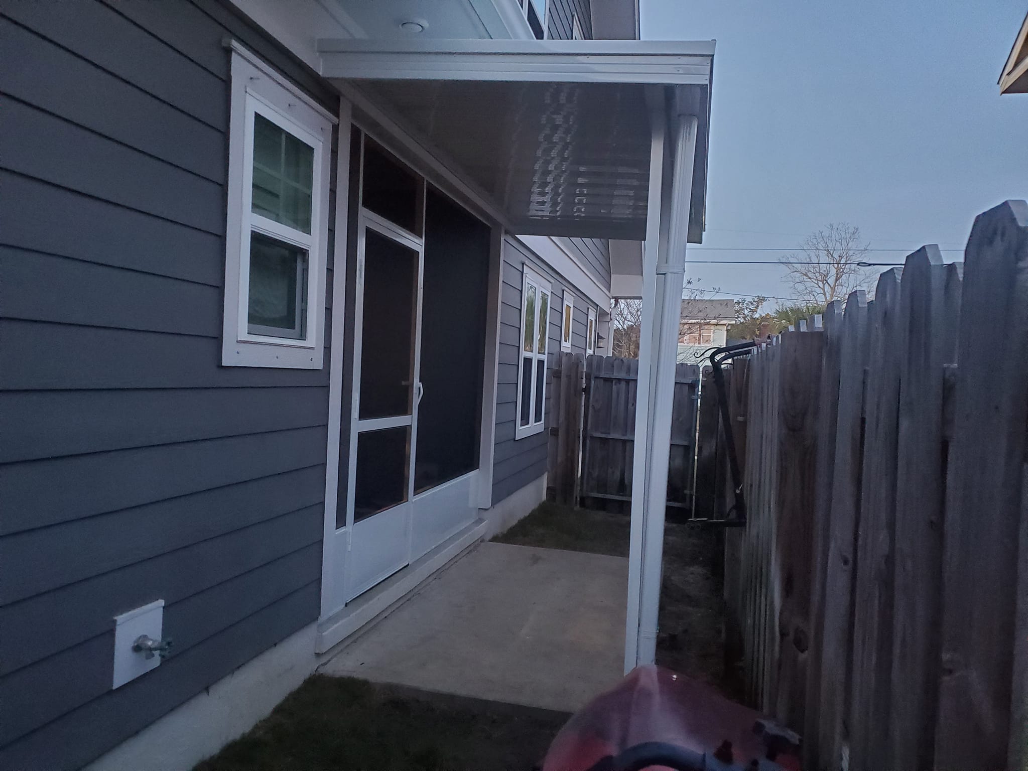 Patio cover with screen and kick panel